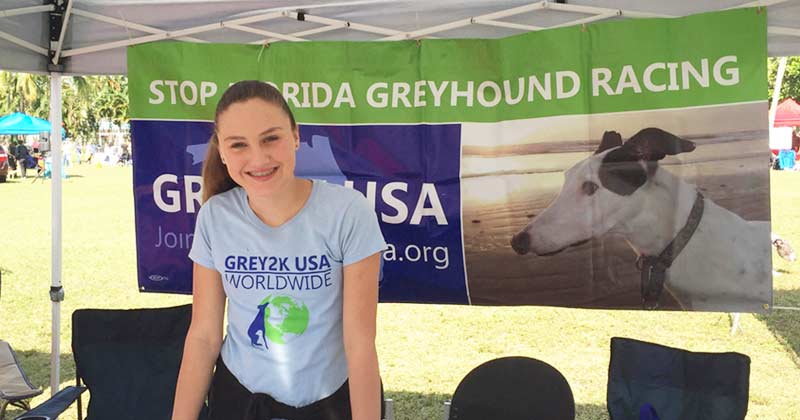 Emily hosts a greyhound outreach table in Florida